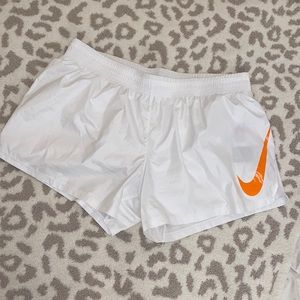 NWT -Nike standard fit women’s running shorts size large